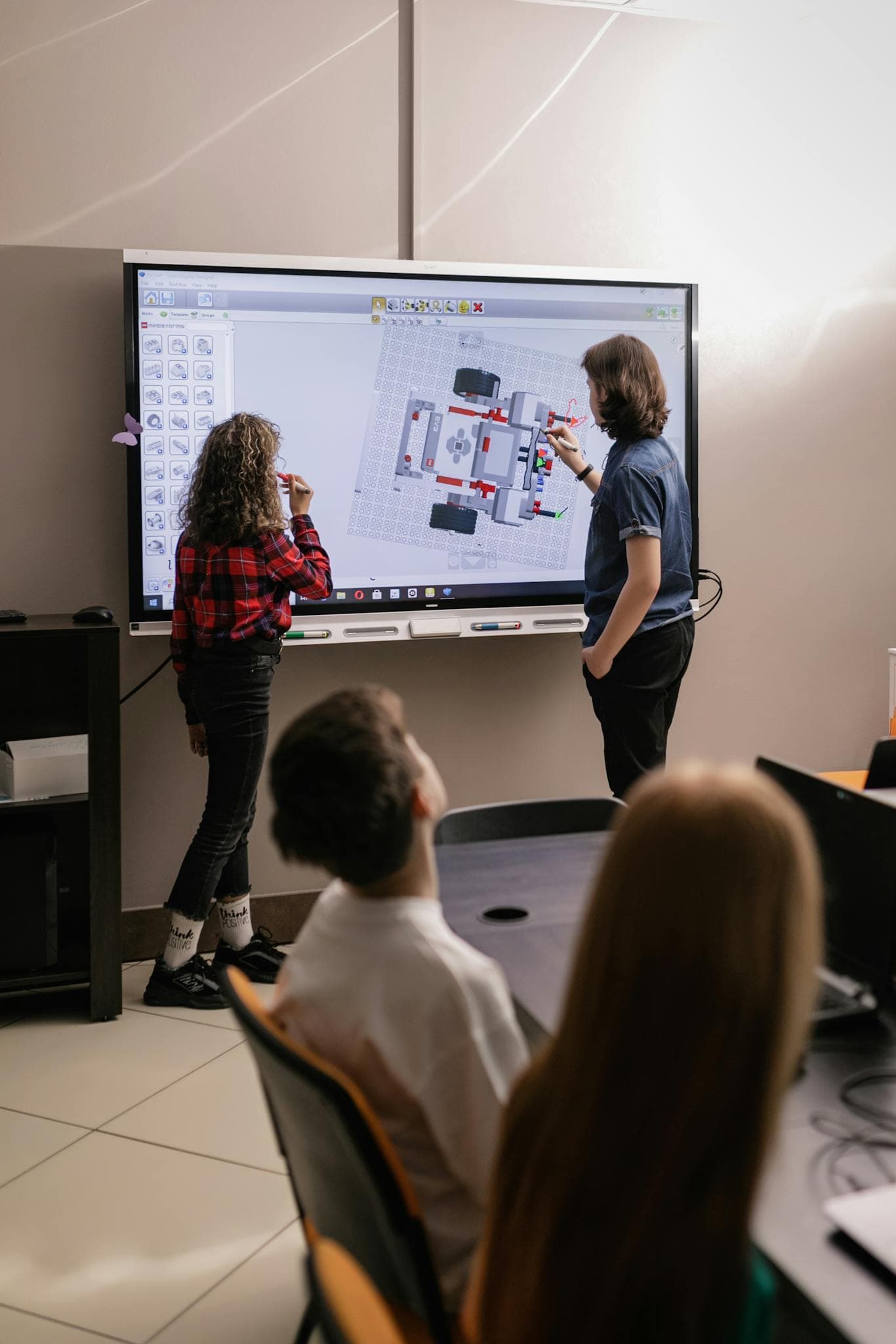 Students collaborating with classroom technology